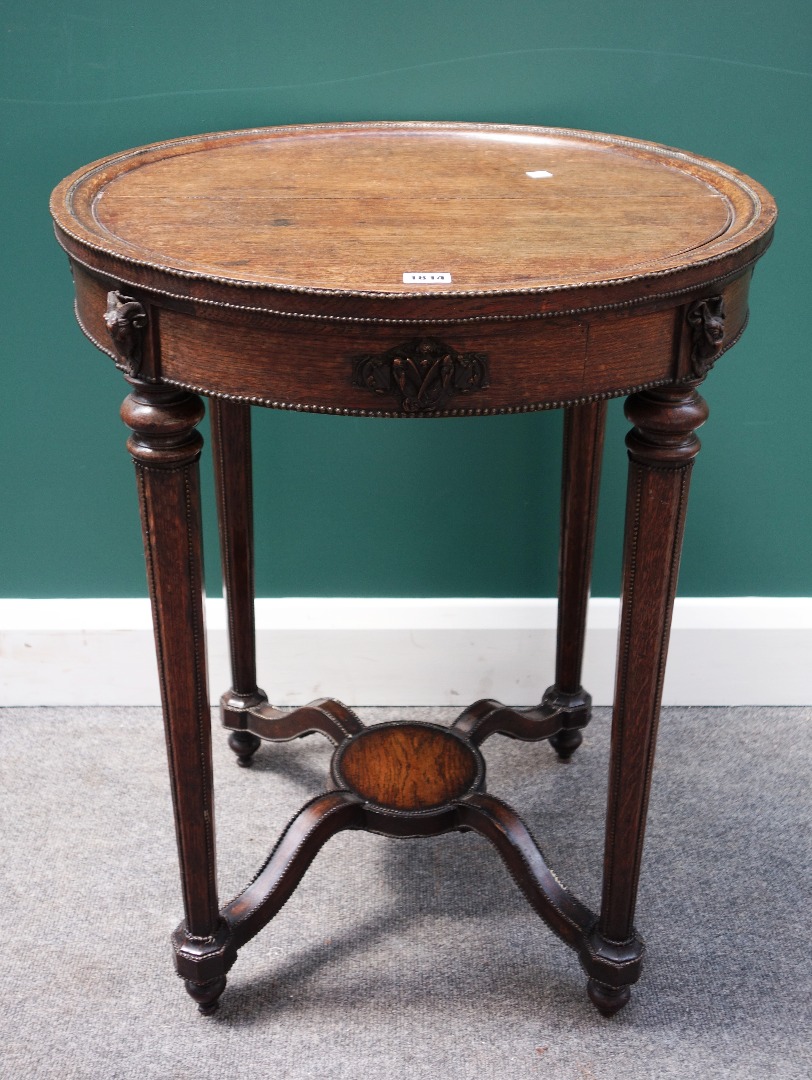 Appraisal: A Louis XVI style gilt metal mounted oak occasional table