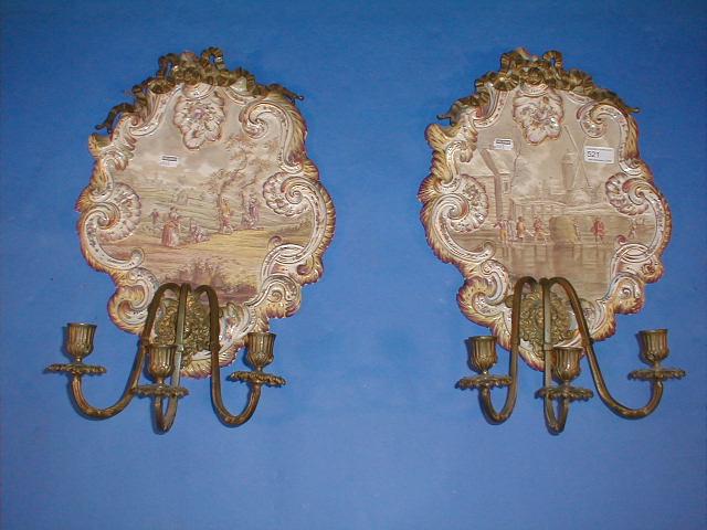 Appraisal: A pair of thC French porcelain girandoles of rococo scrolling