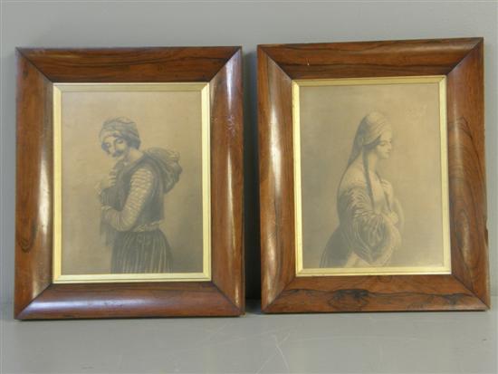 Appraisal: Pair of th century charcoal drawings of a man and