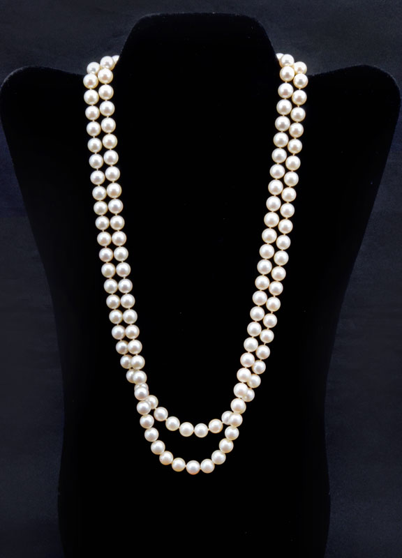 Appraisal: DOUBLE STRAND CULTURED PEARL NECKLACE WITH K PEARL GOLD CLASP