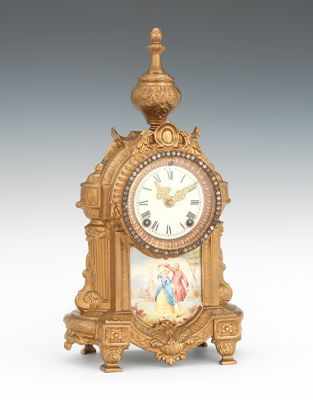 Appraisal: Gold Tone Mantel Clock with Porcelain Decoration Early th century