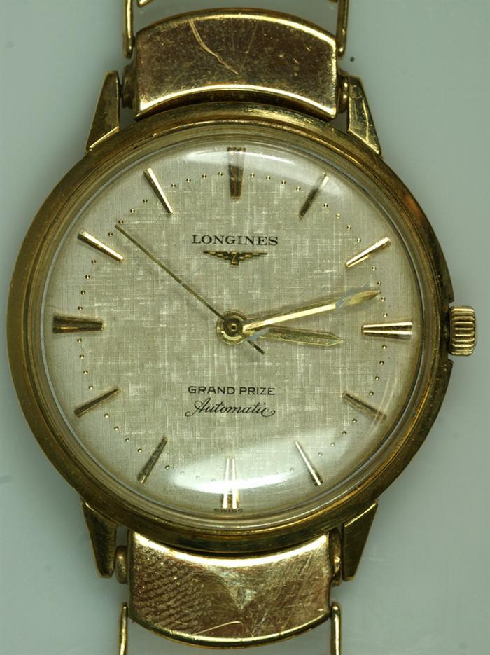 Appraisal: K YG Longines mans wristwatch Grand Prize automatic jewel unadjusted