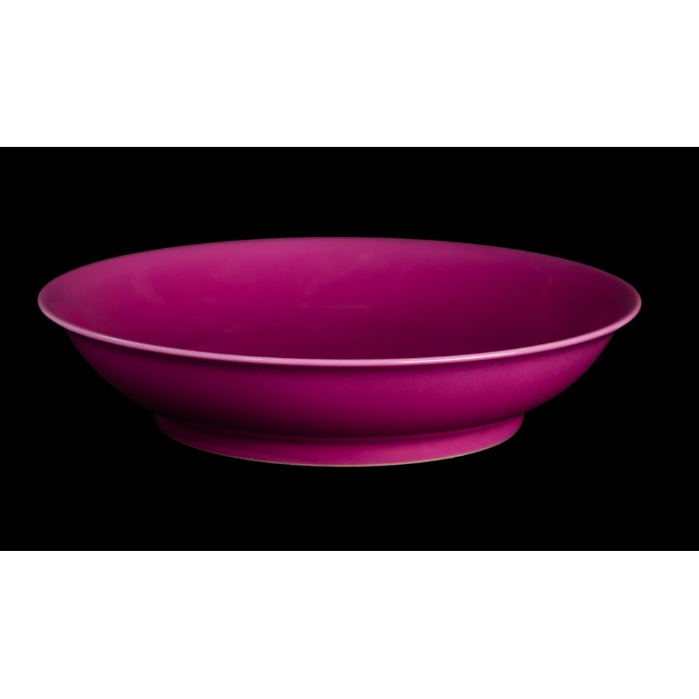 Appraisal: CHINESE PORCELAIN SHALLOW BOWLFuchsia color with white glazed underside having