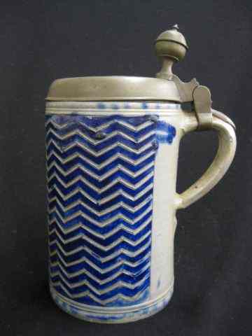 Appraisal: Stoneware Stein salt glaze carvedzig-zag design with cobalt trim -