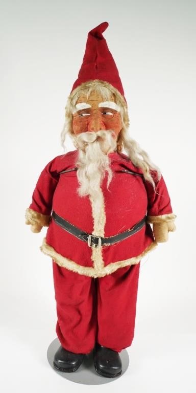 Appraisal: VINTAGE CLOTH SANTA CLAUS DOLLLarge stuffed fabric doll dressed as