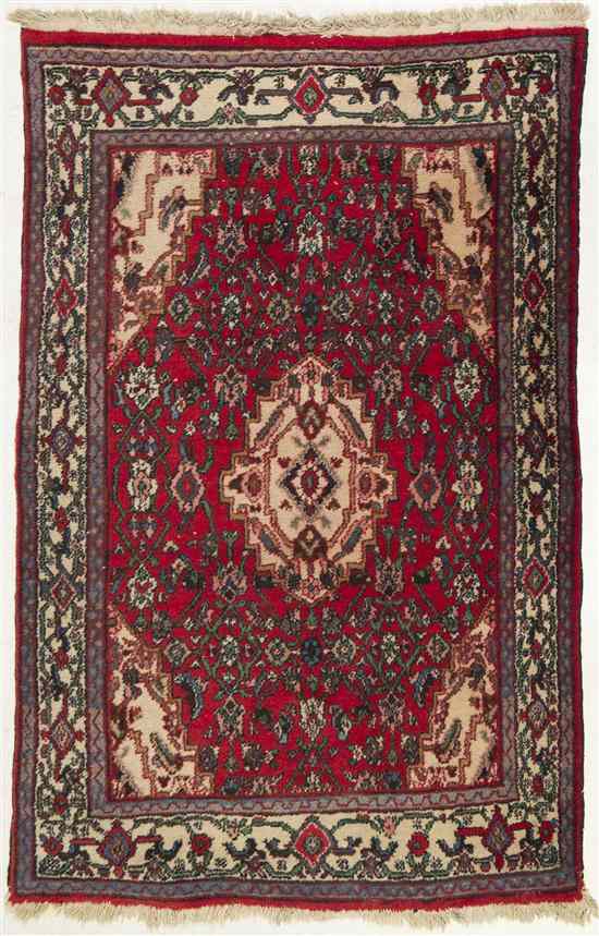 Appraisal: A Northwest Persian Wool Rug having a stylized foliate center