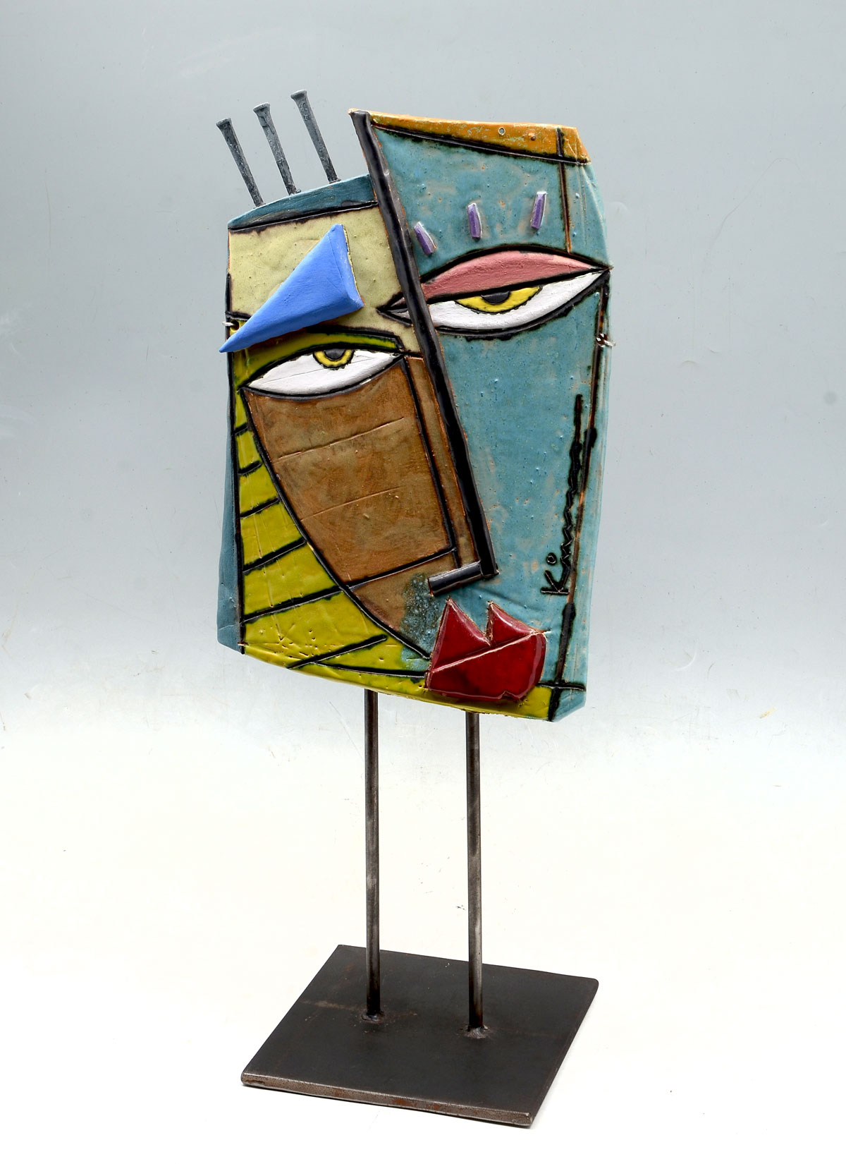 Appraisal: KIMMY CANTRELL PICASSO-LIKE FACE CLAY SCULPTURE Abstract clay sculpture ''Forbidden