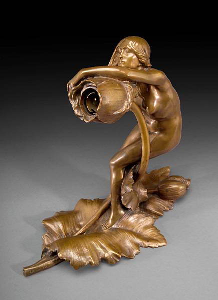 Appraisal: A French Art Nouveau patinated bronze figural lamp after a