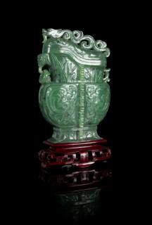 Appraisal: A Carved Spinach Jade Covered Vase Height of the vessel