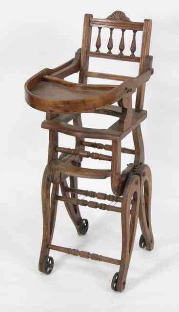 Appraisal: A child's metamorphic high chair in beech with splat back