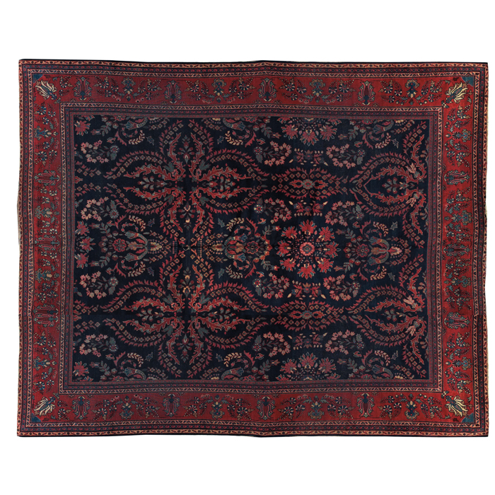 Appraisal: Persian Mohajeran Sarouk rug c floral design on a navy