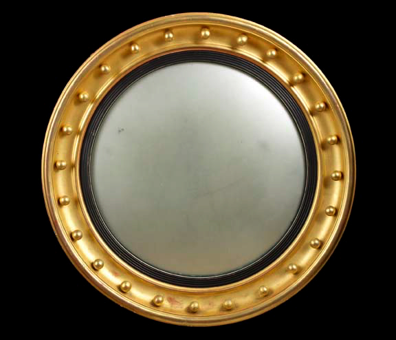 Appraisal: Edwardian Carved and Parcel-Ebonized Giltwood Convex Looking Glass first quarter