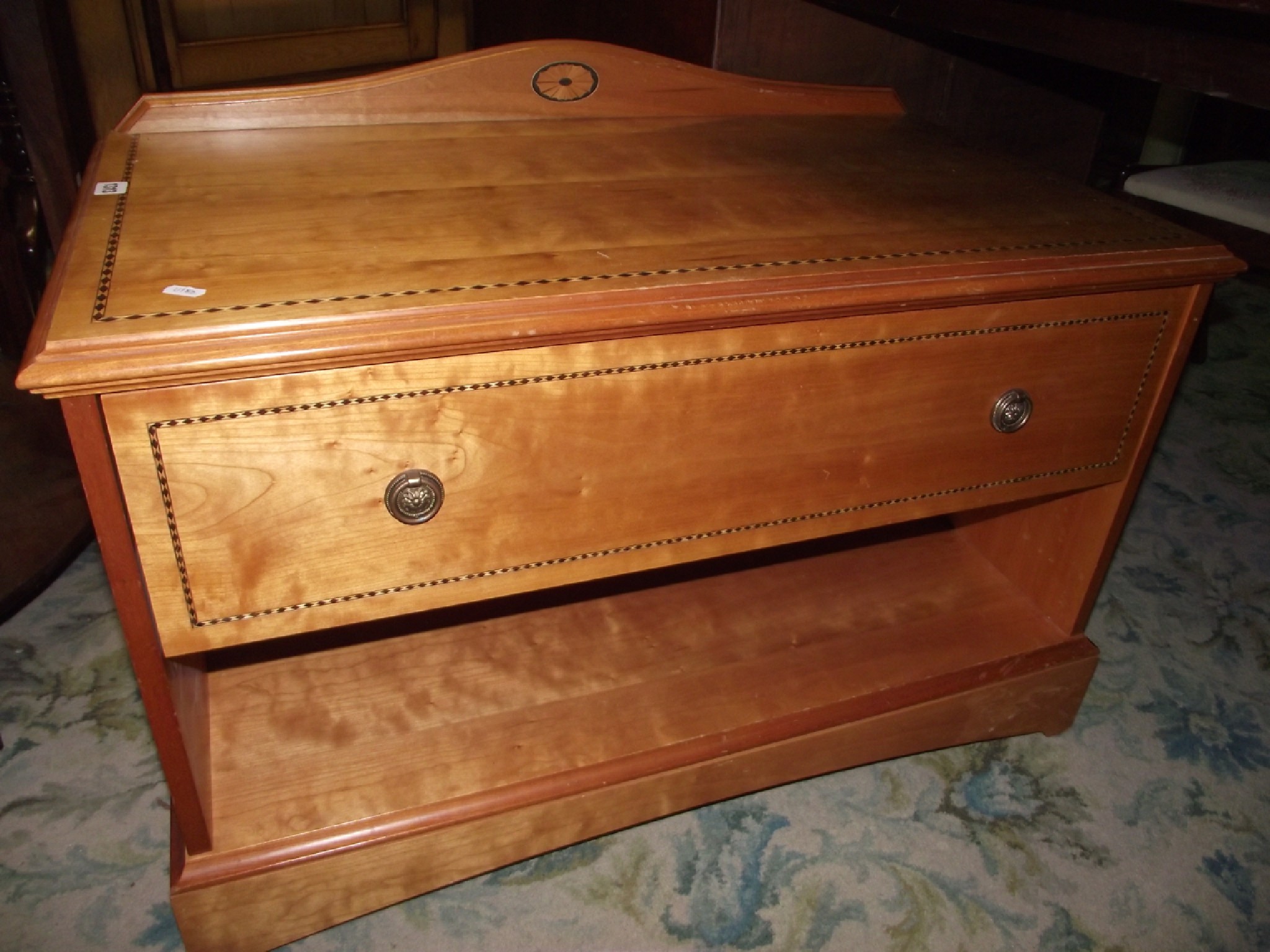 Appraisal: A low contemporary side cabinet with diamond patterned inlaid banded