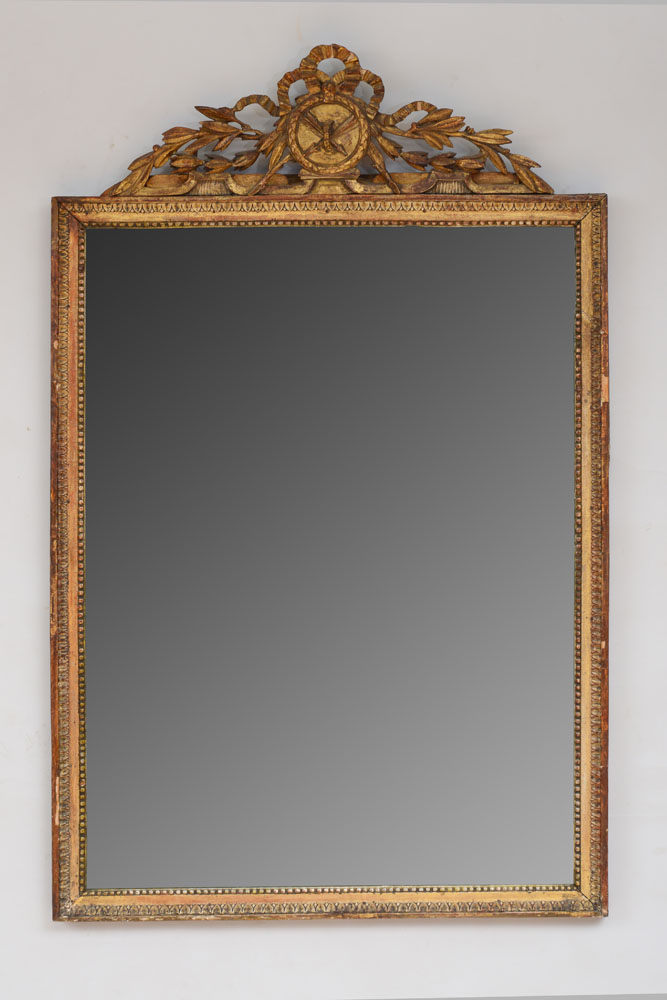 Appraisal: LOUIS XVI GILTWOOD MIRROR The rectangular mirror plate within a