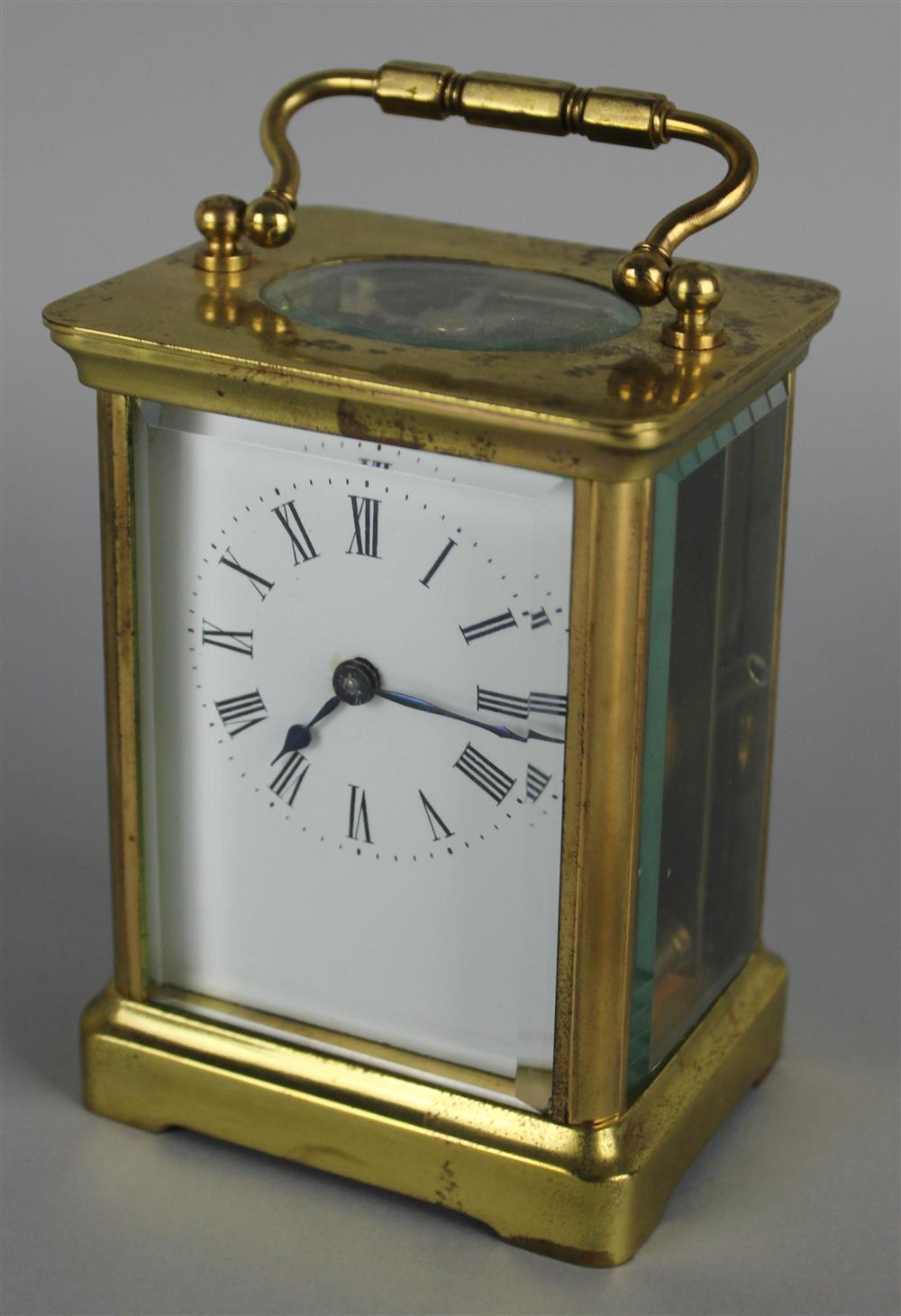 Appraisal: FRENCH BRASS AND BEVELED GLASS CARRIAGE CLOCK th Century no