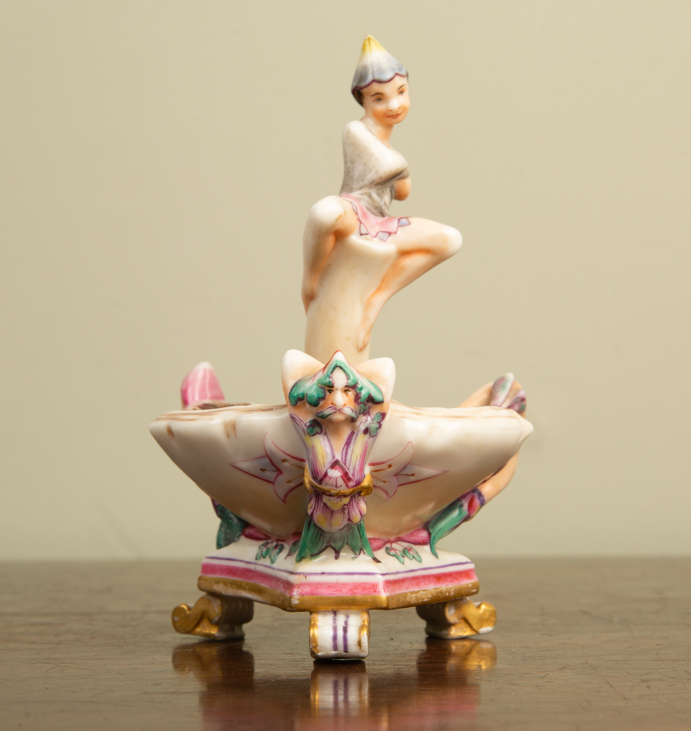 Appraisal: A decorative porcelain ornament possibly Royal Worcester depicting a fairy