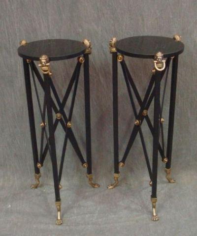 Appraisal: Pair of Marbletop Black and Gold Metal Stands From a