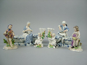 Appraisal: A pair of porcelain Meissen figural salt cellars early th