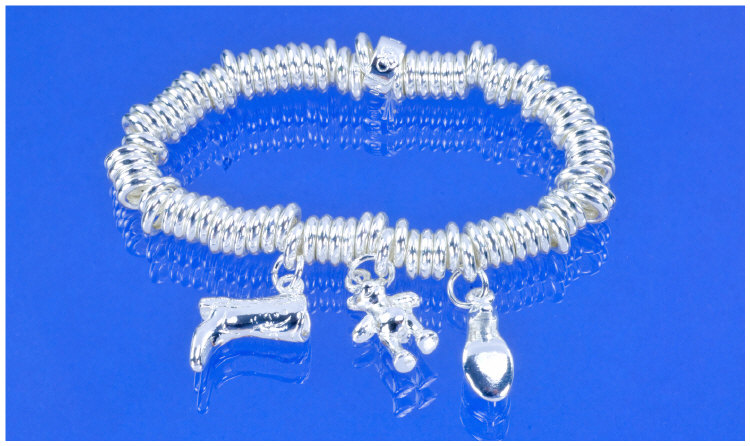 Appraisal: Modern Silver Charm Bracelet With three charms comprising shoe boot