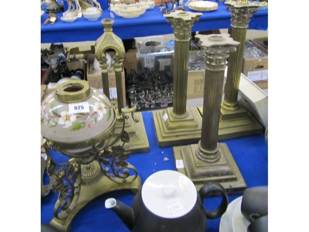 Appraisal: Three brass Corinthian columns and two oil lamp bases