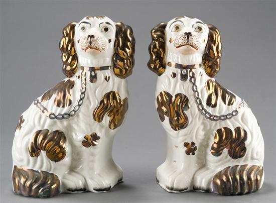 Appraisal: Pair of English staffordshire dogs th century King Charles Spaniels