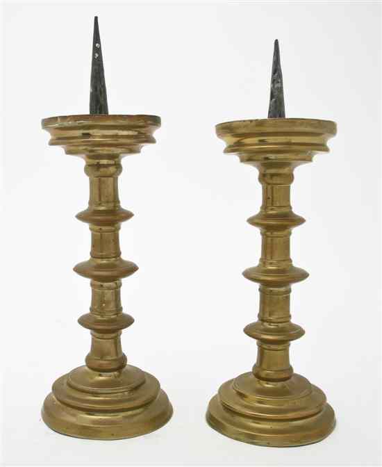 Appraisal: A Pair of Continental Brass and Iron Pricket Sticks each