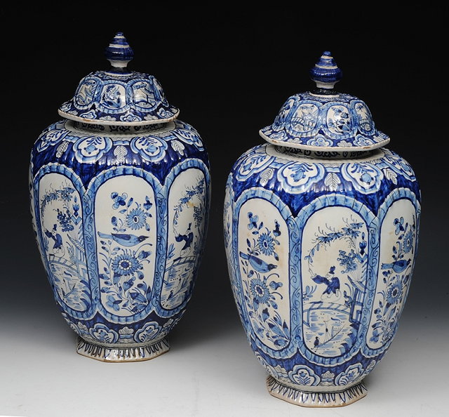 Appraisal: A PAIR OF DELFT BLUE AND WHITE POTTERY VASES and