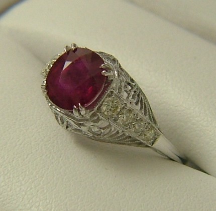 Appraisal: RUBY DIAMOND AND EIGHTEEN KARAT WHITE GOLD RING centering an