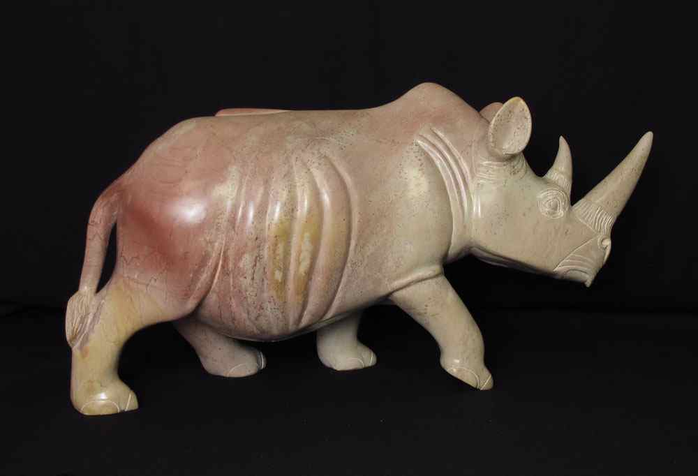 Appraisal: LARGE AFRICAN POLISHED STONE RHINO '' x '' x ''