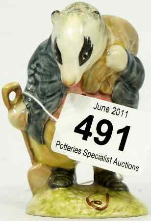 Appraisal: Beswick Beatrix Potter Figure Tommy Brock BP with spade handle