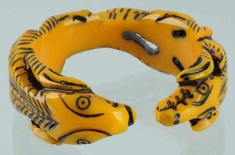 Appraisal: Vintage Bakelite Butterscotch Alligator Bracelet Description Resin washed bangle Condition