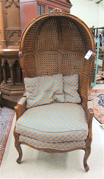 Appraisal: LOUIS XV STYLE CANOPY ARMCHAIR French th century the carved