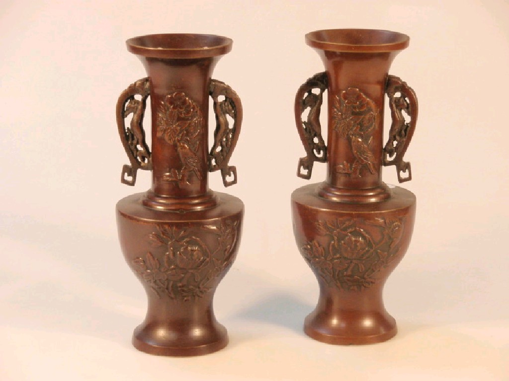 Appraisal: A pair of late thC Japanese bronze vases each with