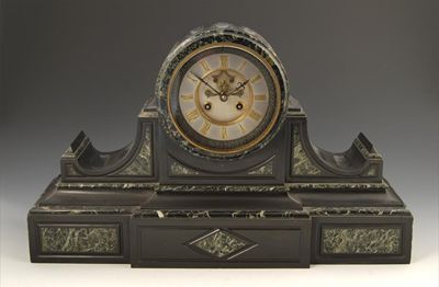 Appraisal: A black slate quarter striking mantel clock movement by S