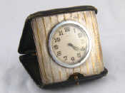 Appraisal: A silver mounted travelling clock hallmarked Birmingham approx cm wide