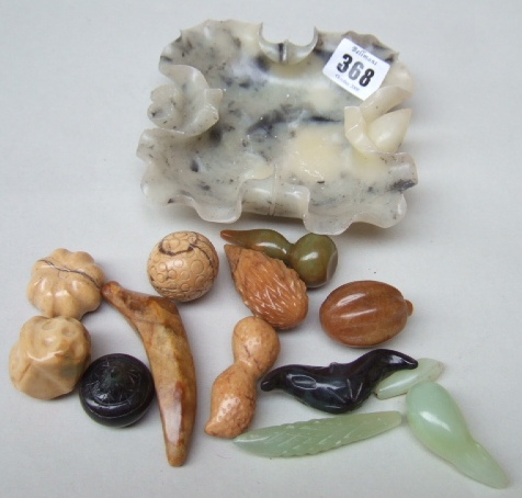 Appraisal: A group of small hardstone carvings of fruit th century