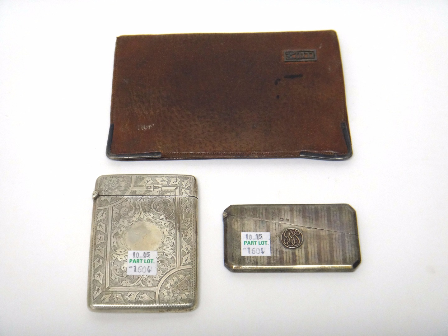 Appraisal: A silver rectangular visiting card case with engraved decoration Sheffield