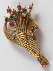 Appraisal: A yellow metal tests carat gold ruby sapphire emerald and