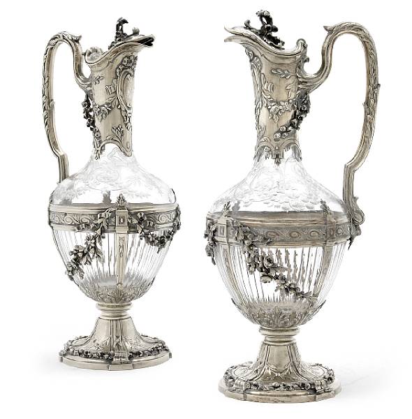 Appraisal: A pair of French standard vermeil mounted cut glass ewers