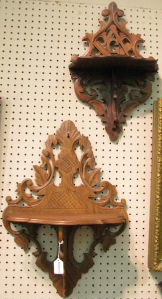 Appraisal: Two Victorian walnut carved folding wall-mount candlestands one with Masonic