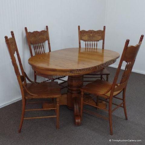 Appraisal: Oak Pedestal Dining Table w Pressed Back Chairs Nice modern