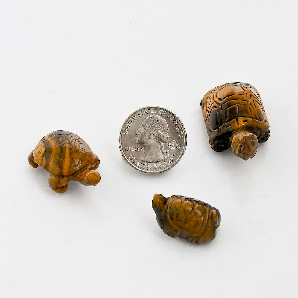 Appraisal: THREE MINIATURE CARVED STONE TURTLE FIGURES Handcarved two from solid