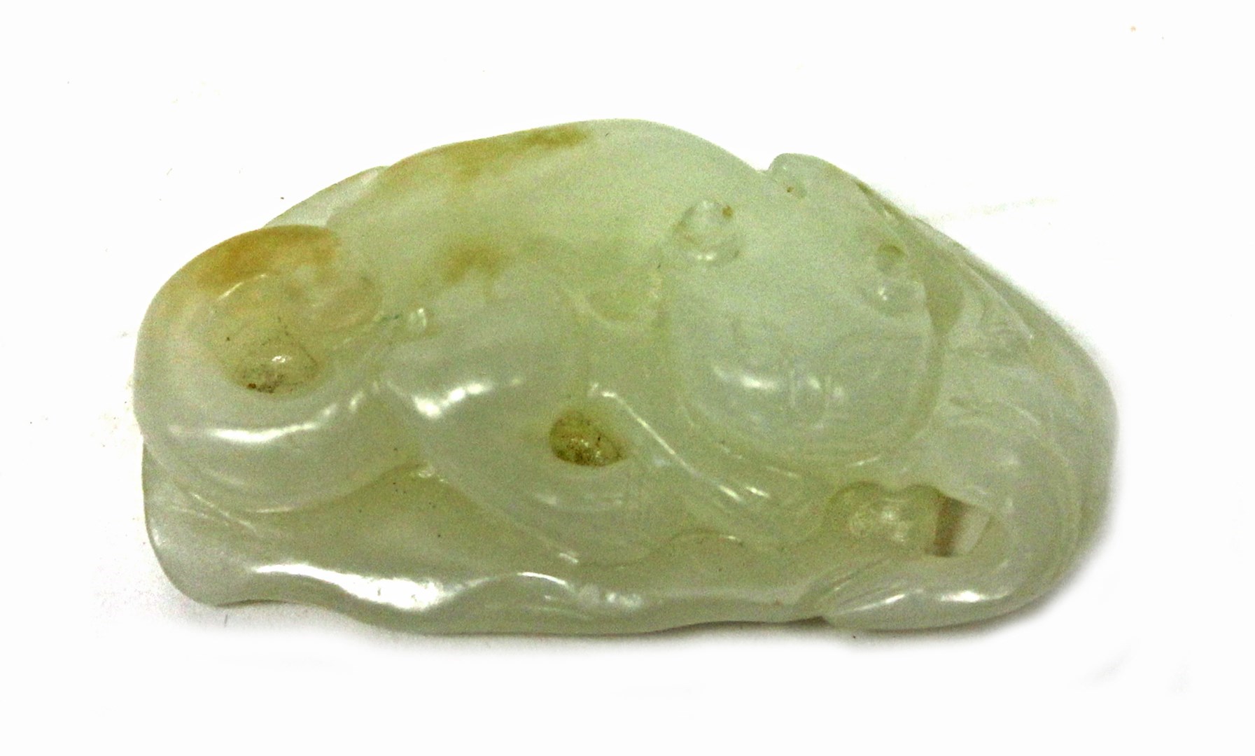 Appraisal: A white jade figure of a cat th century carved