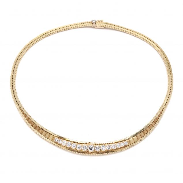 Appraisal: GOLD AND DIAMOND NECKLACE Necklace in a tapered motif designed