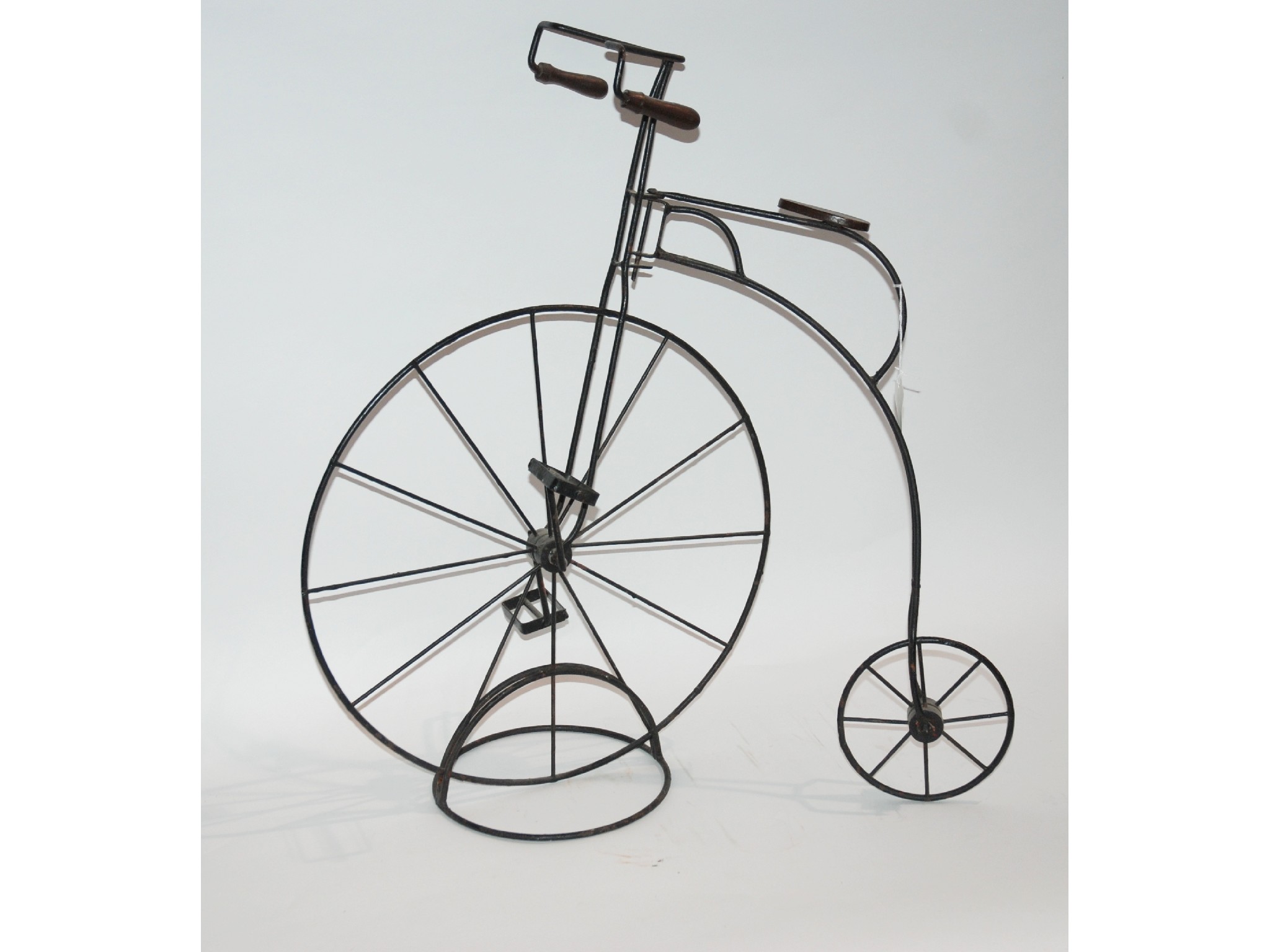 Appraisal: A metal sculpture of a penny farthing