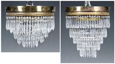 Appraisal: Two similar brass crystal fixtures each with decorated brass ring