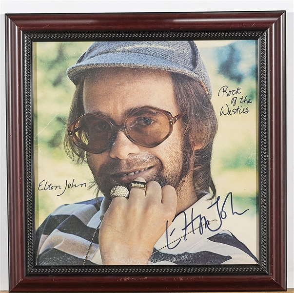 Appraisal: Elton John signed memorabilia framed sq sight approx