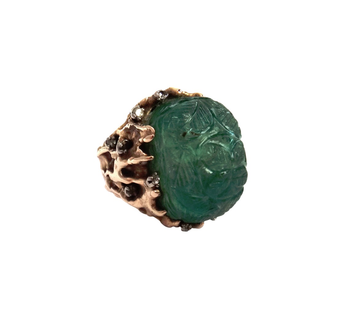 Appraisal: A gold carved emerald and diamond ring the carved emerald