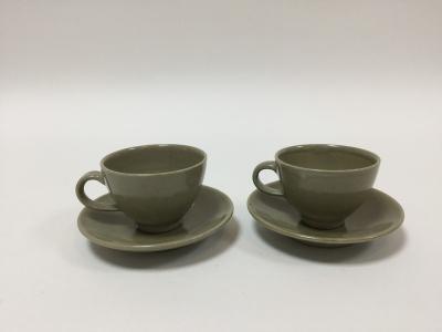 Appraisal: Crowan Pottery two celadon glaze cups and saucers impressed marks