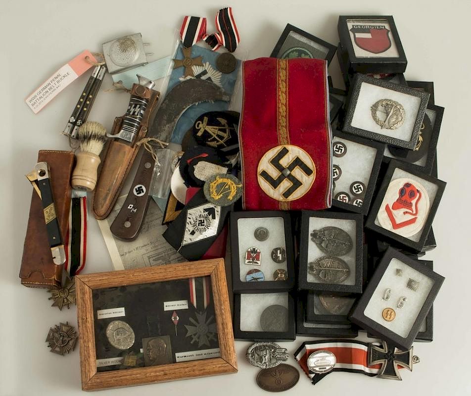 Appraisal: rd Reich Badges knives patches and other items A huge